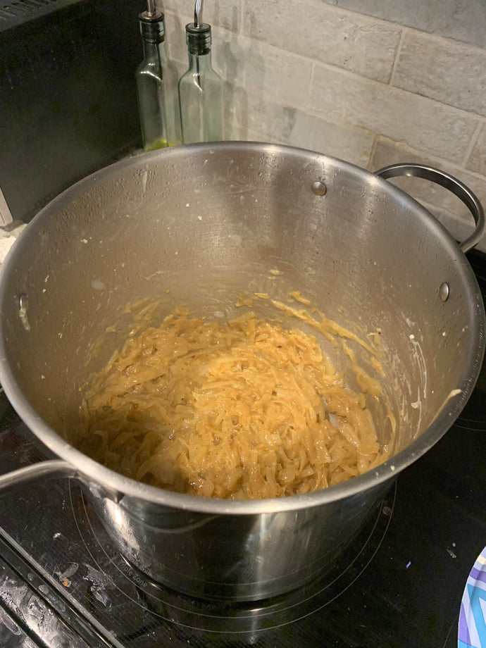 5 lbs of onions slowly getting caramelized for French onion soup