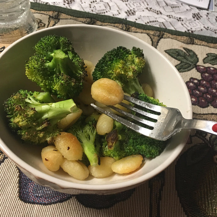 Pan fried gnocchi and roasted broccoli