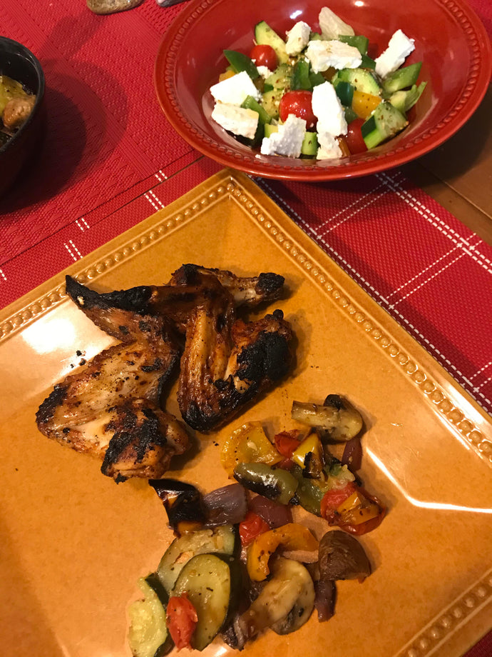 Whats for dinner: Hot Buffalo Chicken wings cooked on the BBQ, roasted veggies (zucchini, mushroom, orange & green bell peppers, cherry tomatoes and red onion) and greek salad and dressing from scratch, of course.