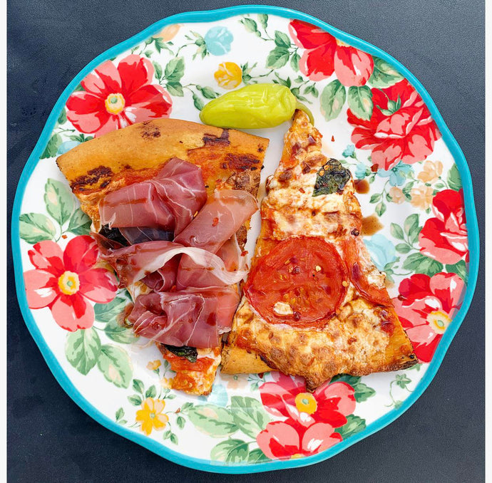 Margherita Pizza and a slice with Prosciutto