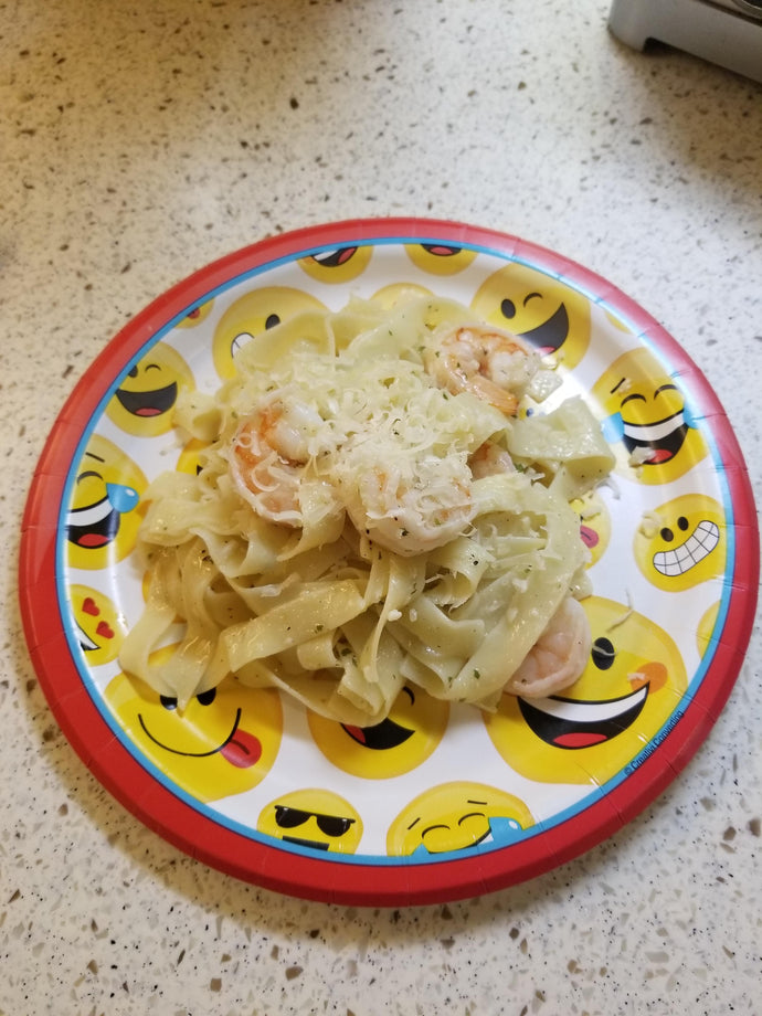 Fettuccini with garlicky shrimp and parmesan. Served on the finest china to celebrate a 13 year olds birthday.