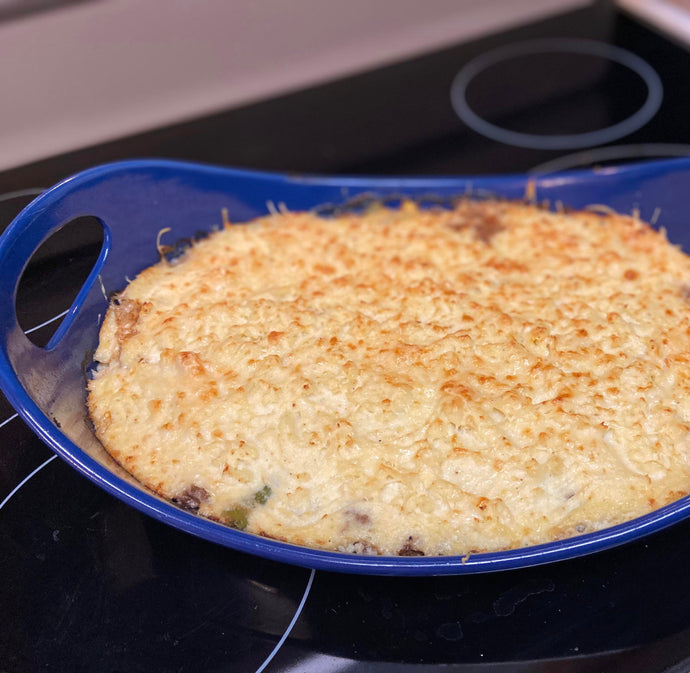 Cottage Pie with mashed cauliflower instead of potatoes. Parmesan on top to make that gorgeous golden crust!