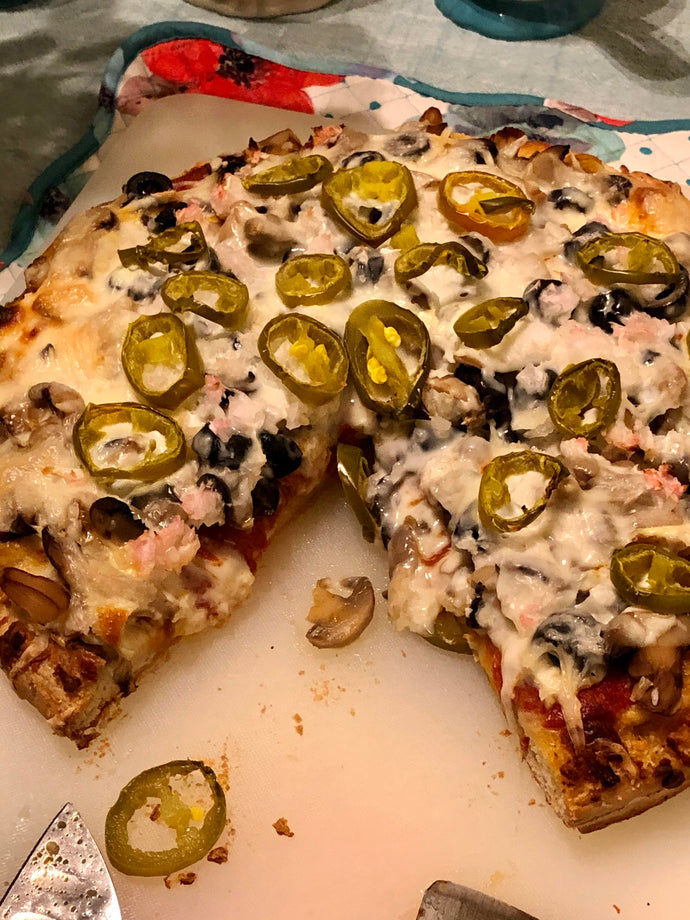 Homemade Loaded Pizza, may not look pretty. But it was yummy!!