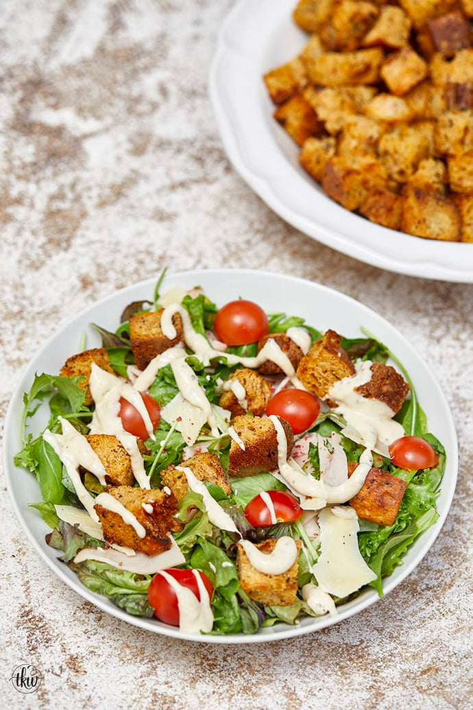These Cheesy Garlic White Cheddar Parmesan Croutons are the perfect way to use up leftover bread and dress up any salad!