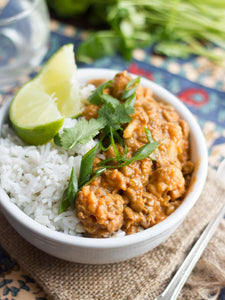 This simple lentil curry is made with a spicy Thai-inspired coconut sauce and tender cauliflower florets! Easy to make with just a handful of ingredients, this one is perfect for a weeknight dinner.