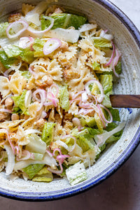 Chickpea Caesar Pasta Salad is crunchy and light with bits of parmesan and pickled shallot