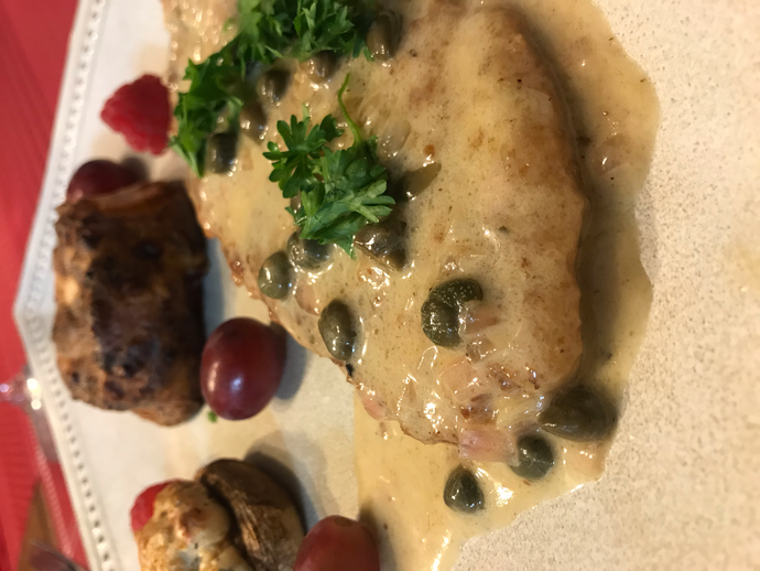 Chicken Picatta with au gratin potato dauphinois & mushroom Neptune with a nice French white wine bordeaux