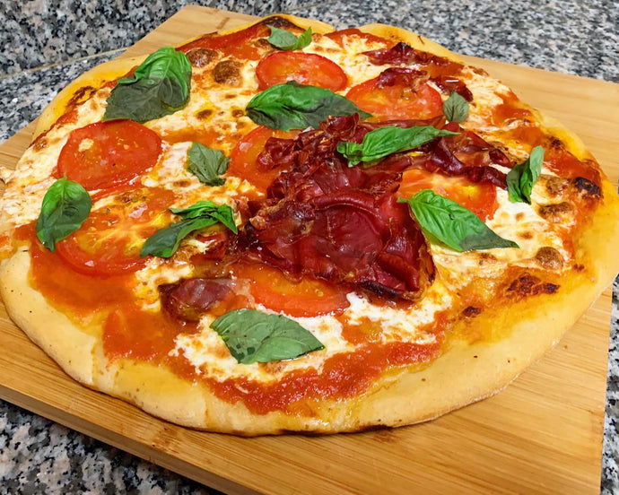 Margherita Pizza tonight! Half with Prosciutto on top