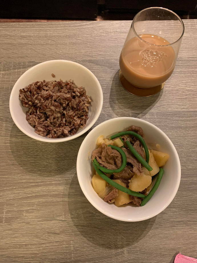 Nikujaga, brown rice medley, and milk tea.