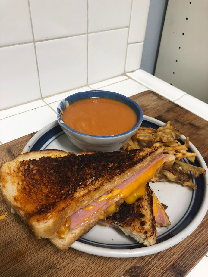 Grilled chipotle ham and cheese, red pepper & tomato bisque, waffle fries