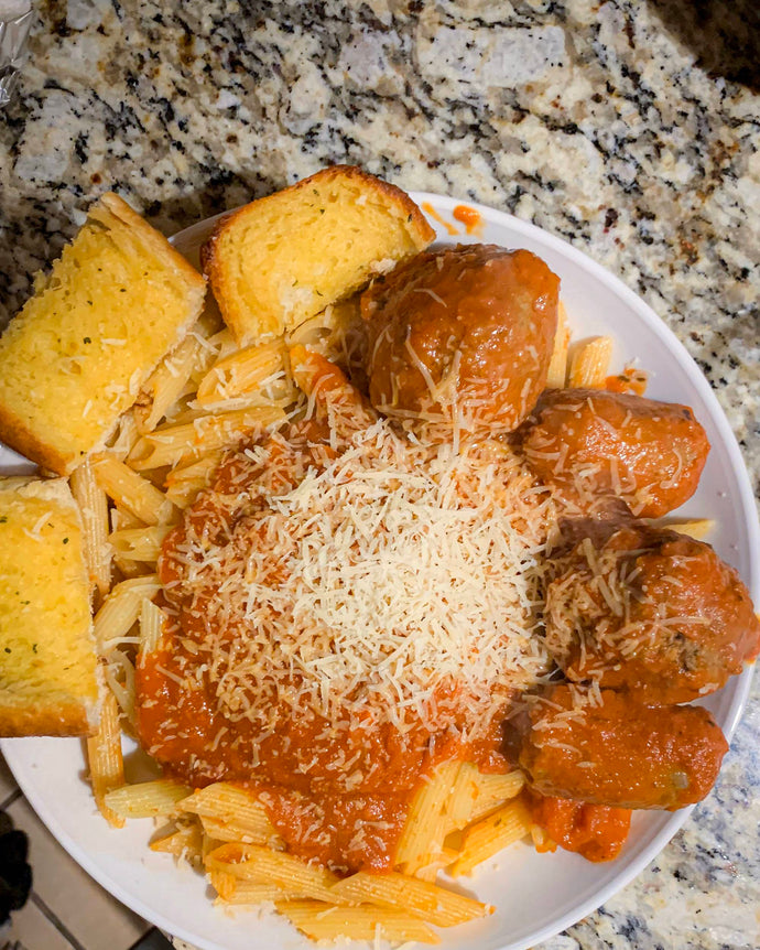 Sunday dinner! Sauce cooked for 5 hours, waaaay too much pasta, meatballs, sausage, and garlic bread. Currently in a carb coma.