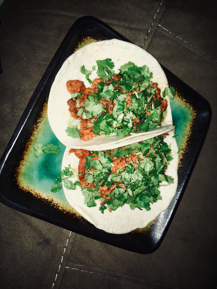 Al pastor tacos, amazing salsa made by local market, lime and cilantro. No onion b/c Im rebellious like that.