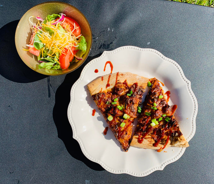 barbecue chicken pizza with a ranch salad